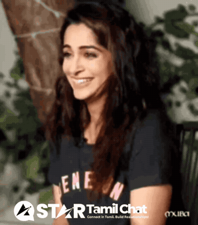 Woman Smiling In Front Of Star Tamil Chat Sign GIF