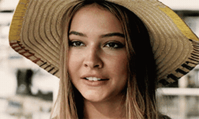 Woman Smiling In Front Of Window With Netflix GIF
