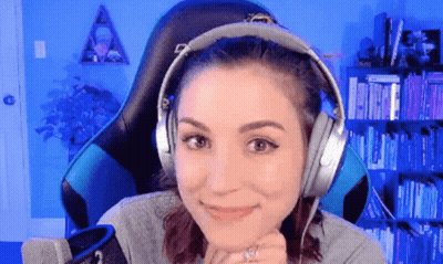 Woman Smiling In Headphones At Microphone GIF