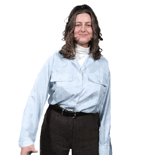 Woman Smiling In Light Blue Shirt And Brown Pants Sticker