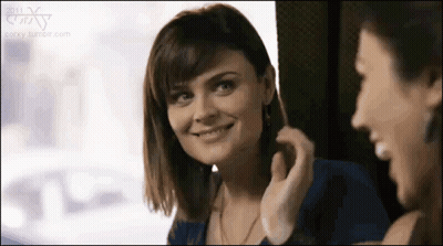 Woman Smiling In Mirror With Another Woman GIF