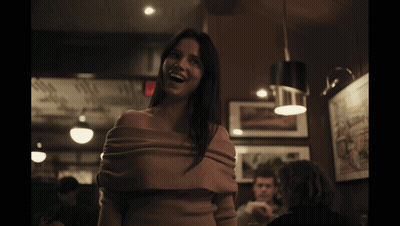 Woman Smiling In Off Shoulder Sweater GIF