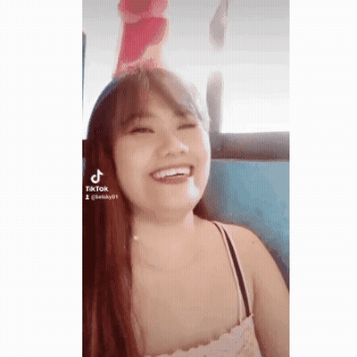 Woman Smiling In Pink Hat GIF