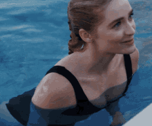 Woman Smiling In Pool GIF