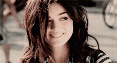 Woman Smiling In Striped Shirt GIF