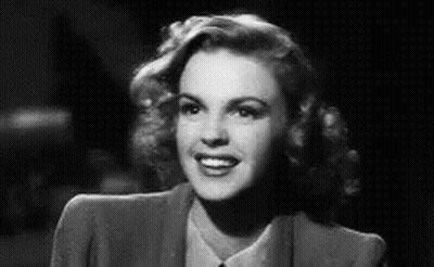Woman Smiling In Suit GIF