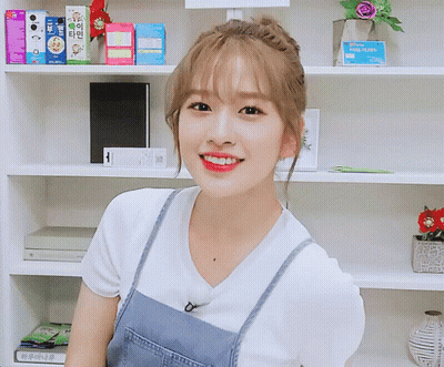 Woman Smiling In White Shirt And Blue Overalls GIF
