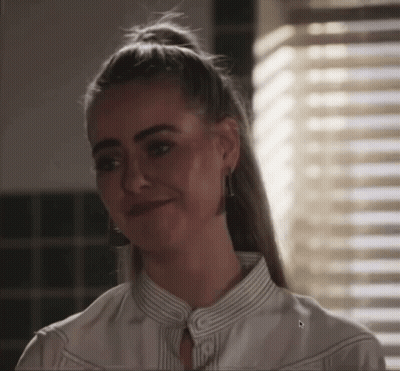 Woman Smiling In White Striped Shirt GIF