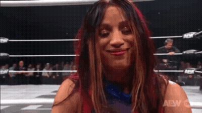 Woman Smiling In Wrestling Ring GIF