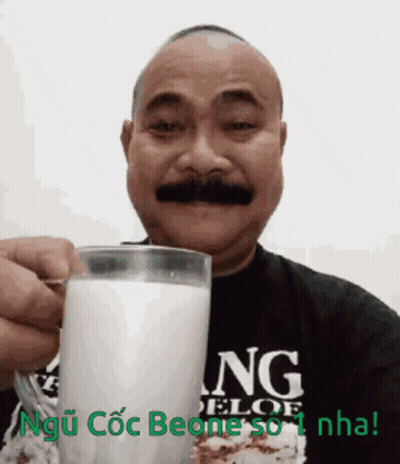 Woman Smiling Pointing At Camera Toddy GIF