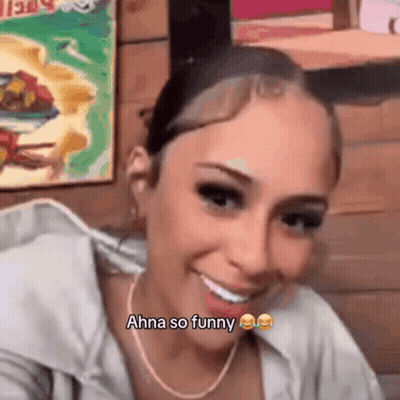 Woman Smiling Saying Ahna So Funny With Necklace GIF