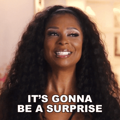 Woman Smiling Saying It's Gonna Be A Surprise GIF