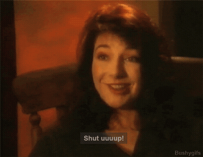 Woman Smiling Saying Shut Up GIF