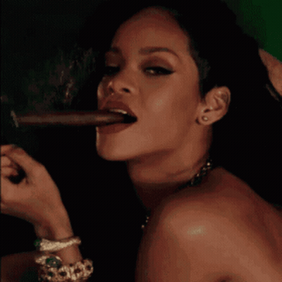 Woman Smiling Smoking Cigar With Tongue Out GIF