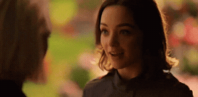 Woman Smiling Talking To Man GIF