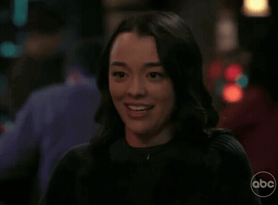 Woman Smiling With Closed Eyes And Open Mouth GIF