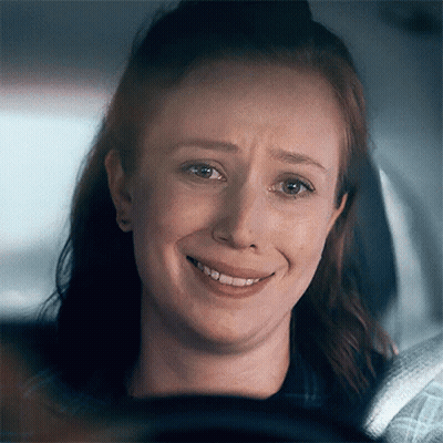 Woman Smiling With Eyes Closed In Car GIF