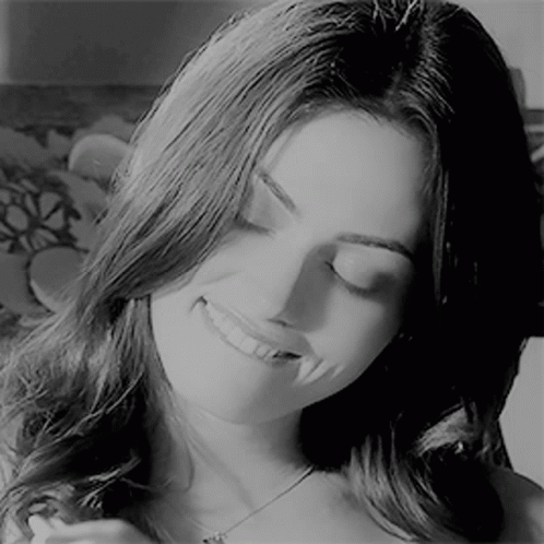 Woman Smiling With Eyes Closed GIF