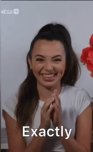 Woman Smiling With Folded Hands GIF