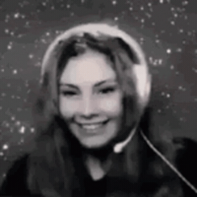 Woman Smiling With Headphones And Microphone GIF