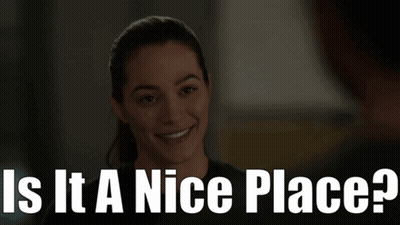 Woman Smiling With Is It A Nice Place GIF