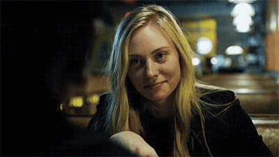Woman Smiling With Man At Table GIF