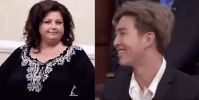 Woman Smiling With Man In Suit And Tie GIF