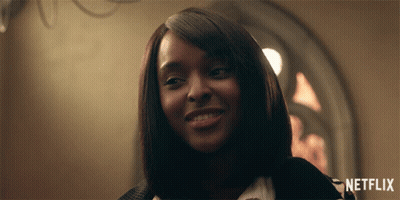 Woman Smiling With Netflix Logo GIF