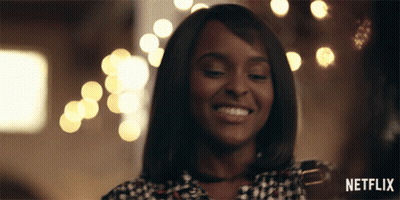 Woman Smiling With Netflix Logo GIF