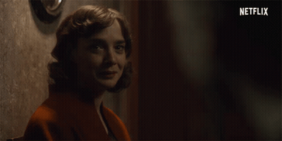 Woman Smiling With Netflix Logo GIF