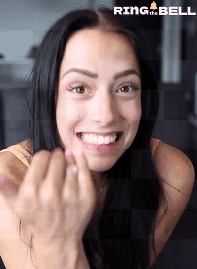 Woman Smiling With Ring Bell Logo GIF