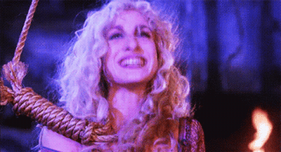 Woman Smiling With Rope Around Neck GIF