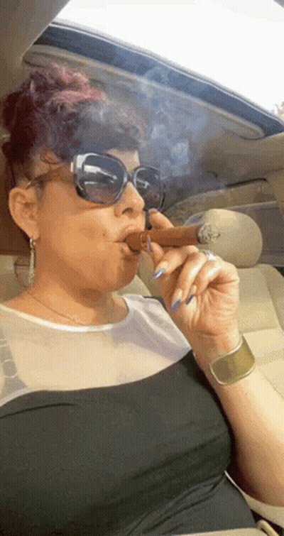 Woman Smoking Cigar With Tongue Out GIF