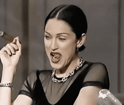 Woman Smoking Cigar With Tongue Out GIF