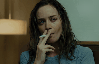 Woman Smoking Cigarette Hand On Nose GIF