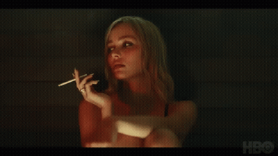 Woman Smoking Cigarette In Dark Room HBO GIF