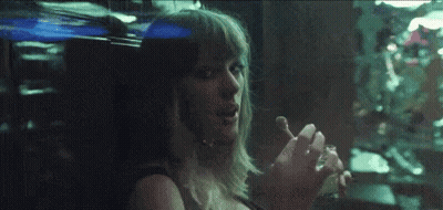 Woman Smoking Cigarette Looking Out Dark Window GIF
