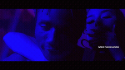 Woman Smoking Cigarette Next To Man With WorldStarHipHop GIF