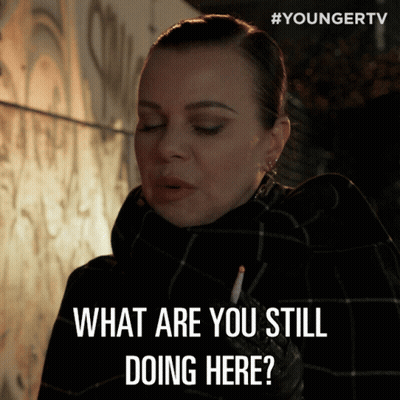 Woman Smoking Cigarette Saying What Are You Still Doing Here GIF