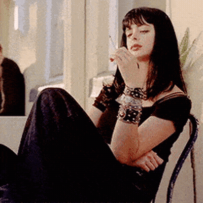 Woman Smoking Cigarette With Bracelets GIF