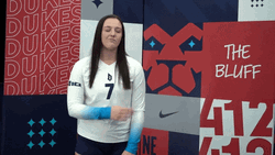 Woman Soccer Player Double Shoulder Brush GIF