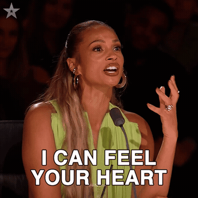 Woman Speaking Into Microphone Saying I Can Feel Your Heart GIF