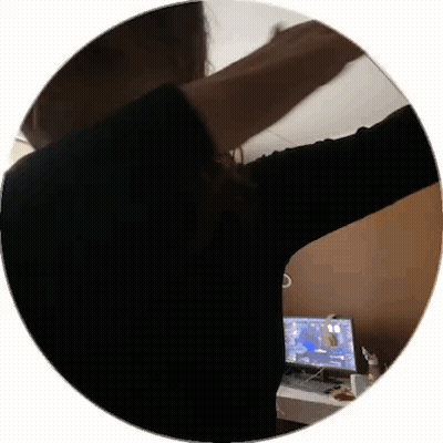 Woman Standing At Computer With Arms Outstretched GIF