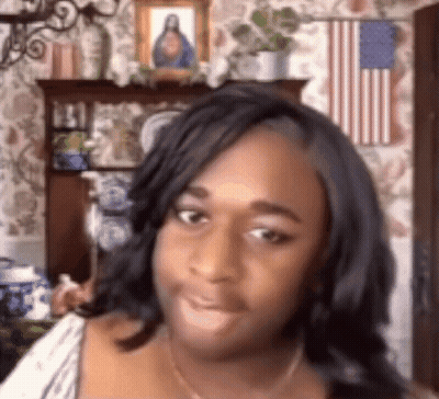 Woman Standing Before American Flag And Jesus GIF