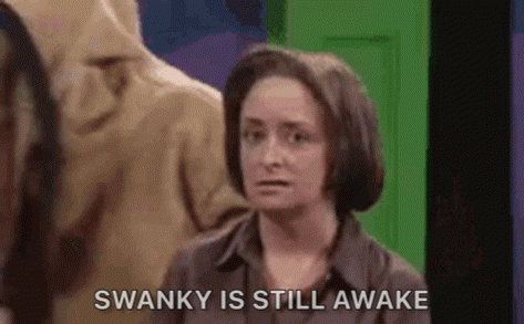 Woman Standing Before Green Door Swanky Is Still Awake GIF