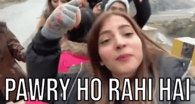 Woman Standing Before Group Saying Pawry Ho Rahi Hai GIF