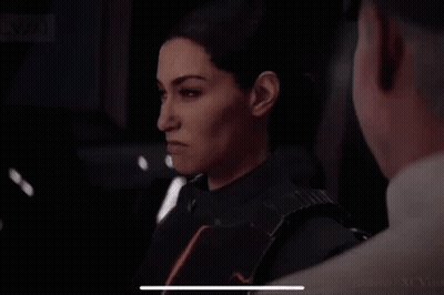 Woman Standing Beside Man In Dark Room GIF