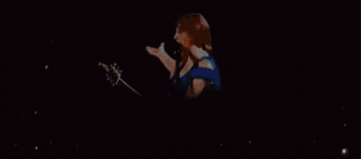 Woman Standing By Billboard P891 GIF