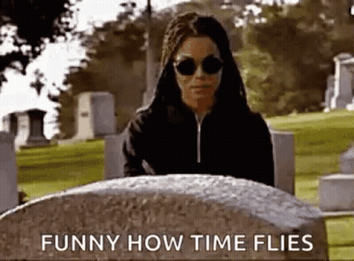 Woman Standing By Grave In Cemetery GIF