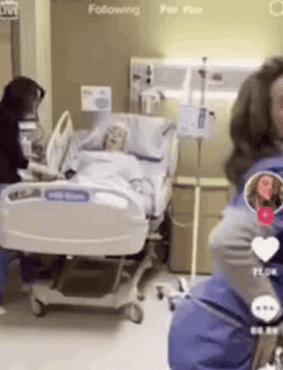 Woman Standing By Hospital Bed GIF